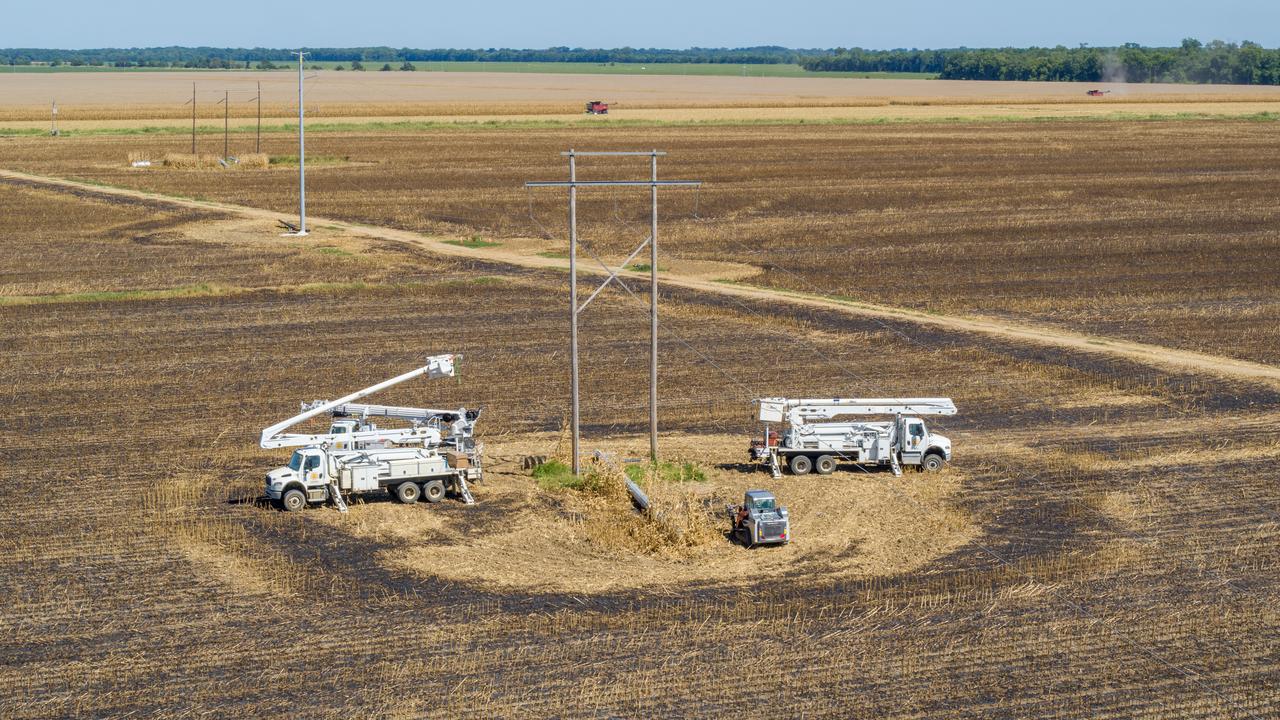 Crews replace wooden transmission poles in Hollandale